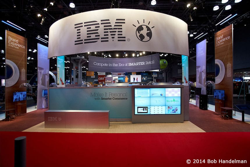 The IBM booth entrance with the red carpet and the IBM sign overhead