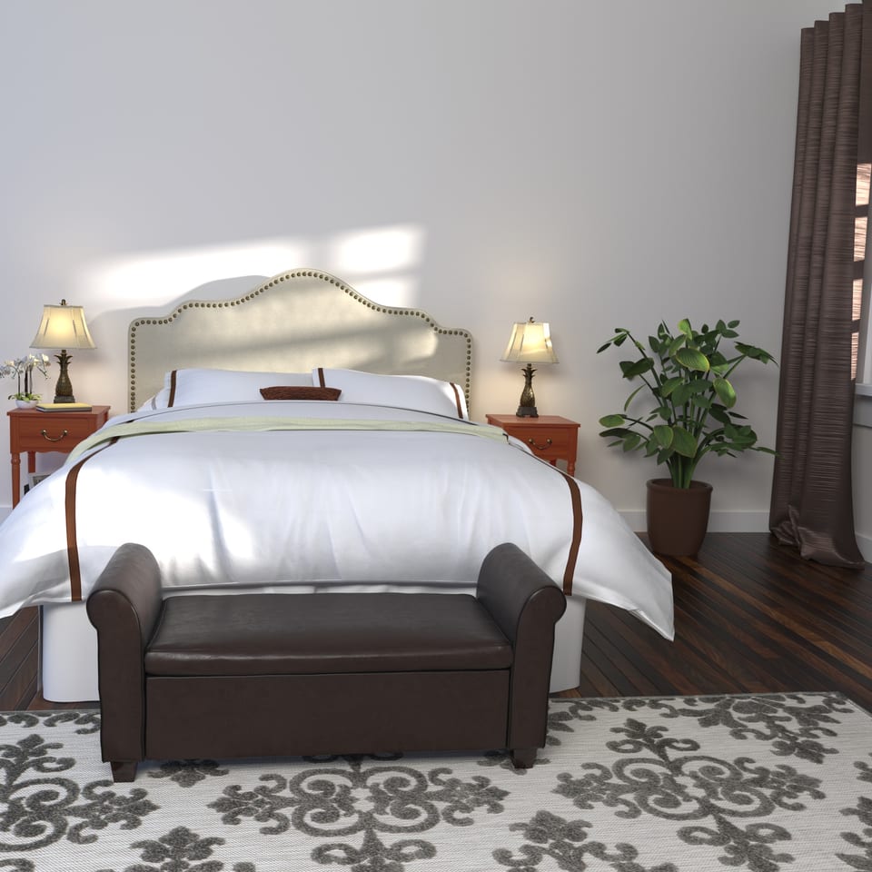 3D rendering of a master suite with a bed, bench and patterned rug